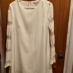 White dress with scalloped mesh sleeves